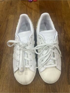 Adidas Women’s White Leather Shelltoe Sneakers with Gold Heel Tab